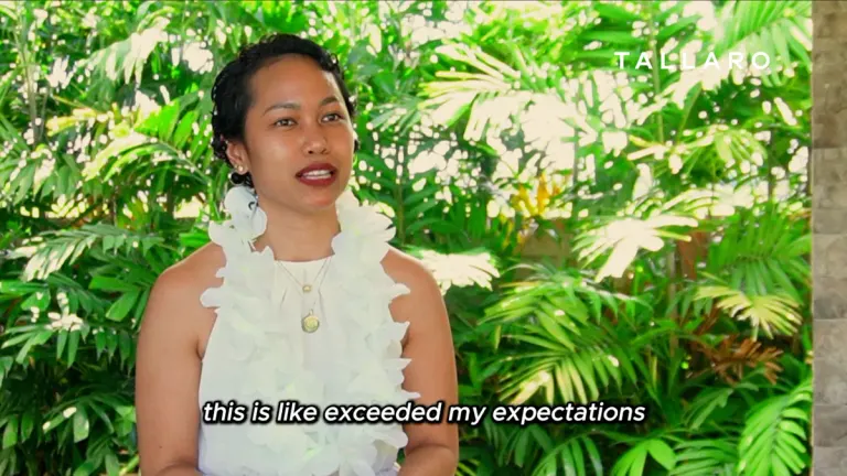 Dr. Jasmine Aquino speaking to camera among the greenery at the Tallaro Healing Center.